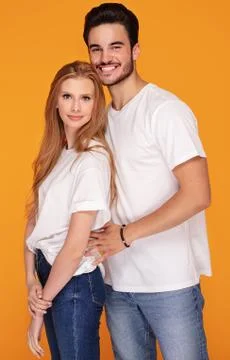 Happy young couple posing in studio. Stock-Fotos