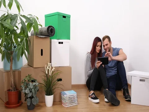 Happy Young Couple Using Digital Tablet for Planning Activity Team Living Home Stock Footage 80279108