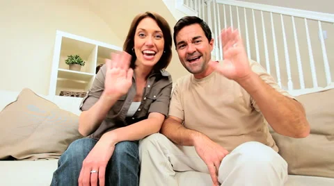 Happy Young Couple Using Online Internet Webchat Stock Footage 4360847