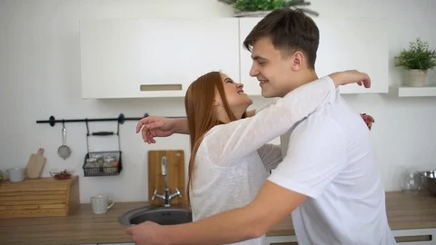 Happy young couple viewing a potential new home. slow-motion Stock Footage