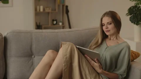 Happy young designer drawing on a graphics tablet with a stylus pen. Stock Footage 224538135