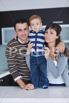 Happy young family have fun at home Stock Photos