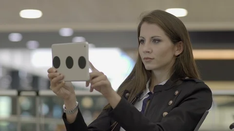 Happy Young Female Using Touchscreen Tablet Computer Device Stock-Footage 87716625