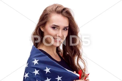 Happy young girl holding USA flag isolated on white background Stock Photos