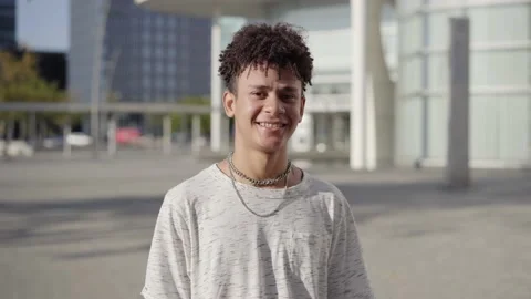 Happy young Latin guy looking at the camera with smiling. Stock Footage 207238971
