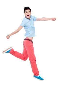 Happy young man jumping Foto stock