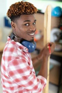 Happy young man looking at the camera Stock Photos