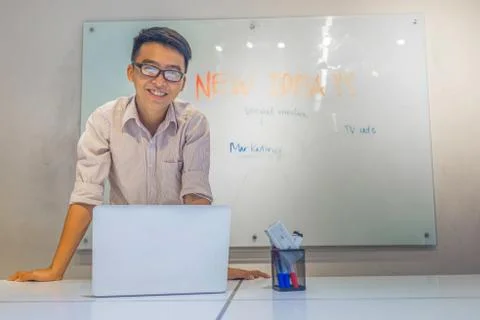 Happy young man making presentation in conference room Stock-Fotos