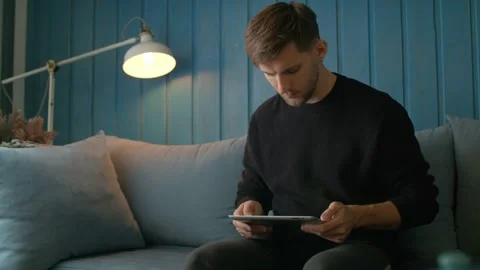 Happy Young Man Using Digital Tablet Ipad Computer In Cafe Stock Footage 97579806