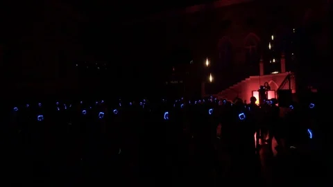 Happy young people are dancing and having fun at silent disco party Stock Footage 107742004
