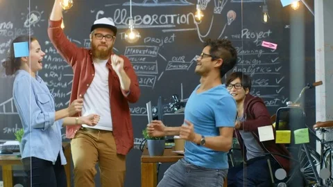 Happy Young People Dancing in the Office. Creative People Have Fun. Stock Footage