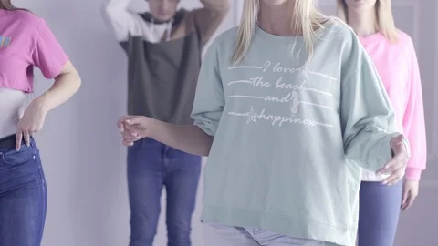 Happy young people dancing while spending time at home Stock Footage 126210857