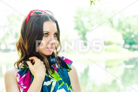 Happy young woman outdoors Stock Photos