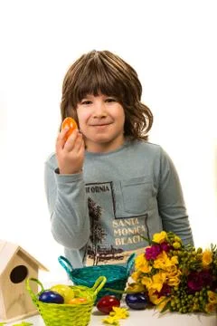 Happyy boy showing Easter egg 写真素材