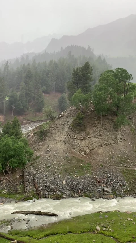 Haramosh Khaltro Heavy Rain – Real Sound with River Alongside Stock Footage 304937355
