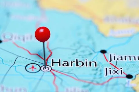 Harbin pinned on a map of China Stock Photos