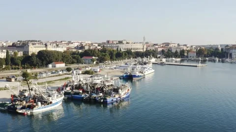 Harbor with boats, Pula Croatia, aerial circling Stock Footage