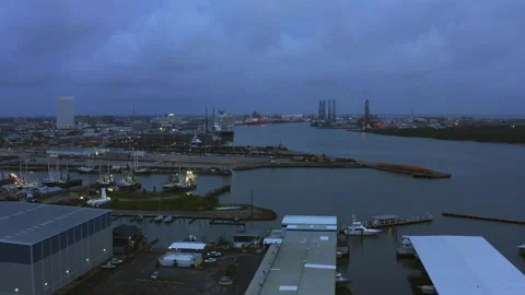 A harbor with a city in the background, early cloudy morning. Video stock 237119605