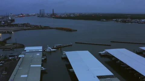 A harbor with a city in the background, early cloudy morning. Video stock 237120285