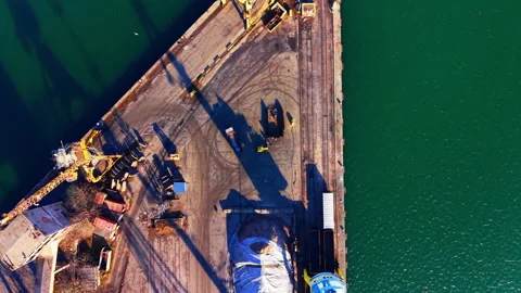 Harbor crane and covered cargo storage area, Burgas, Bulgaria Stock Footage 337195924