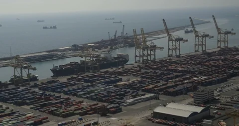 At the harbor a freighter is loaded  Stock Footage 98790712