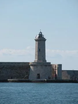 Harbor lighthouse Stock Photos