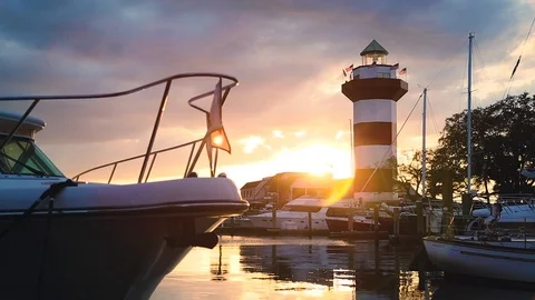 Harbor with Lighthouse Sunset Stock Footage