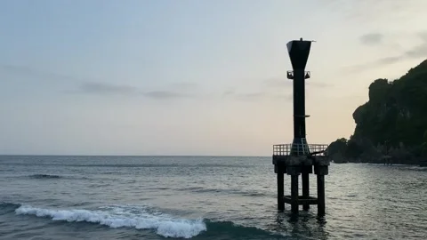 Harbor Lighthouse by the Tropical Coast at Sunset Vídeo Stock 334746329