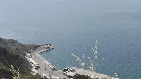 Harbor Ormos Athinios at Santorini Isle (Greece). 스톡 동영상 76948382