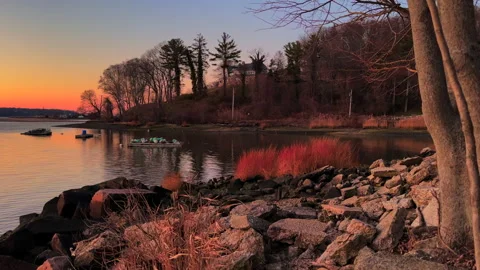 Harbor Sunset in Winter with Rocks Video stock 227571149