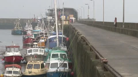Harbor Wall Sheltering Boats Stock Footage 11152224