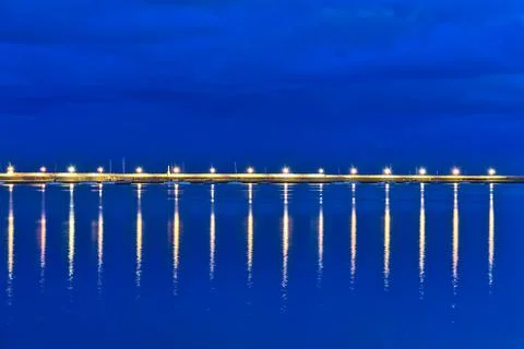Harbor's lanterns lighting in the evening Stock Photos