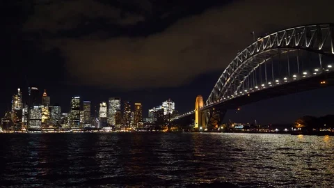 Harbour Bridge and view over Sydney skyline at night Stock Footage 103848315