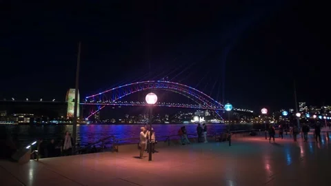 Harbour bridge to Sydney Opera House during Vivid 4K Stock Footage 165526997