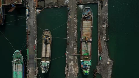 Harbour scene captured overhead. Ideal for shipping and logistics content Vídeos de archivo 335302114