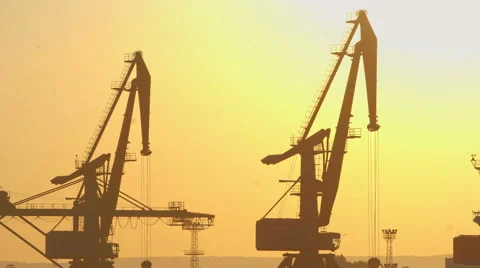 Harbour ship cranes moving load at port, Sunset Time lapse Stock Footage 58740262