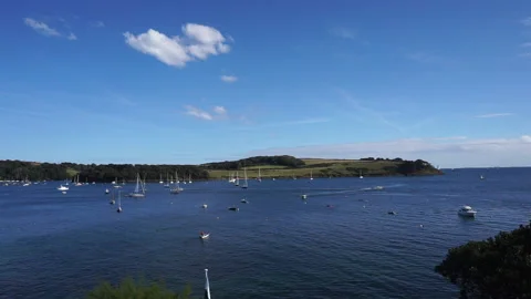 Harbour view in St Mawes Cornwall with yacths and blue skies part 1 Stock Footage 139010258