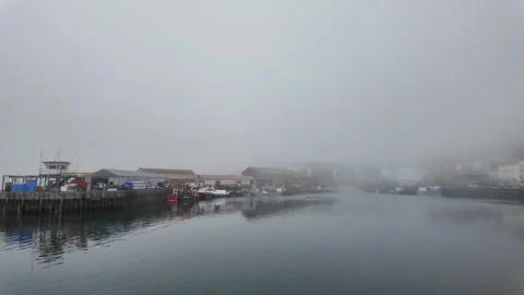 Harbour Waterfront Covered in Dense Coastal Fog 库存影片 346751213