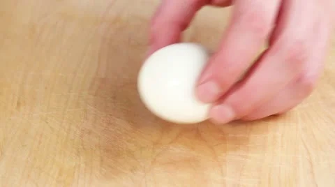 A hard boiled egg being chopped Stock Footage 24656029