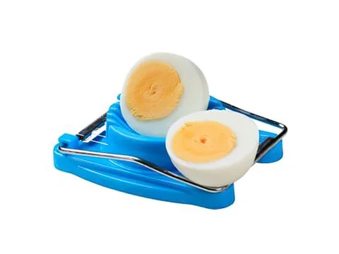 Hard-boiled egg cutter on blue holder Stock Photos