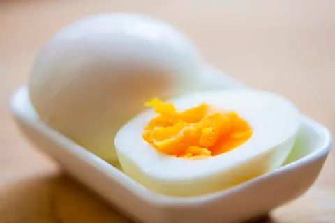 Hard boiled egg in a small dish Stock-Fotos
