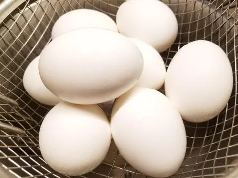 Hard Boiled Eggs in Basket Stock Photos