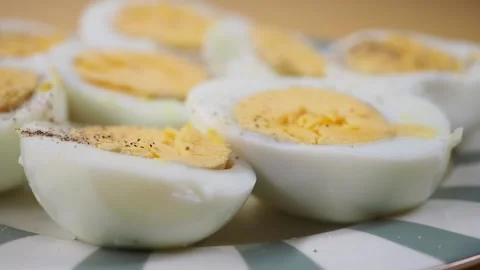 Hard boiled eggs prepared in kitchen setting Stock Footage 344235400