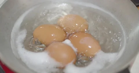 Hard-boiled eggs that were hard-boiled in water were boiling. Stock Footage 222619935