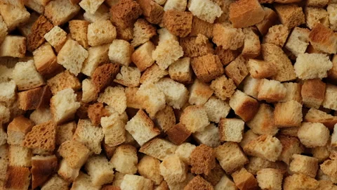 Hard bread crackers top view, sliding shot. Bread crumbs Stock Footage 171908709