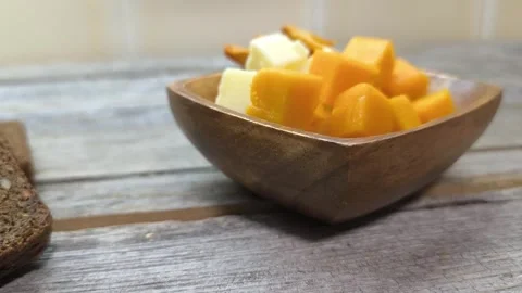Hard cheese slices on a plate. Stock Footage 289779403