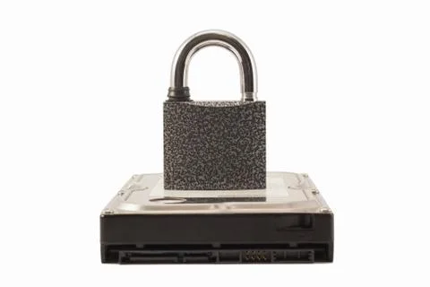 Hard disk and padlock on a white background. The lock is locked Stock Photos