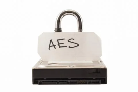 Hard disk and padlock on a white background. The lock is locked Stock Photos