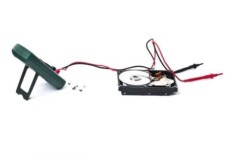 Hard disk and tester Stock Photos