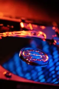 A hard disk with a blue binary code Foto stock